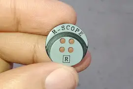 Laser engraved branding in buttons